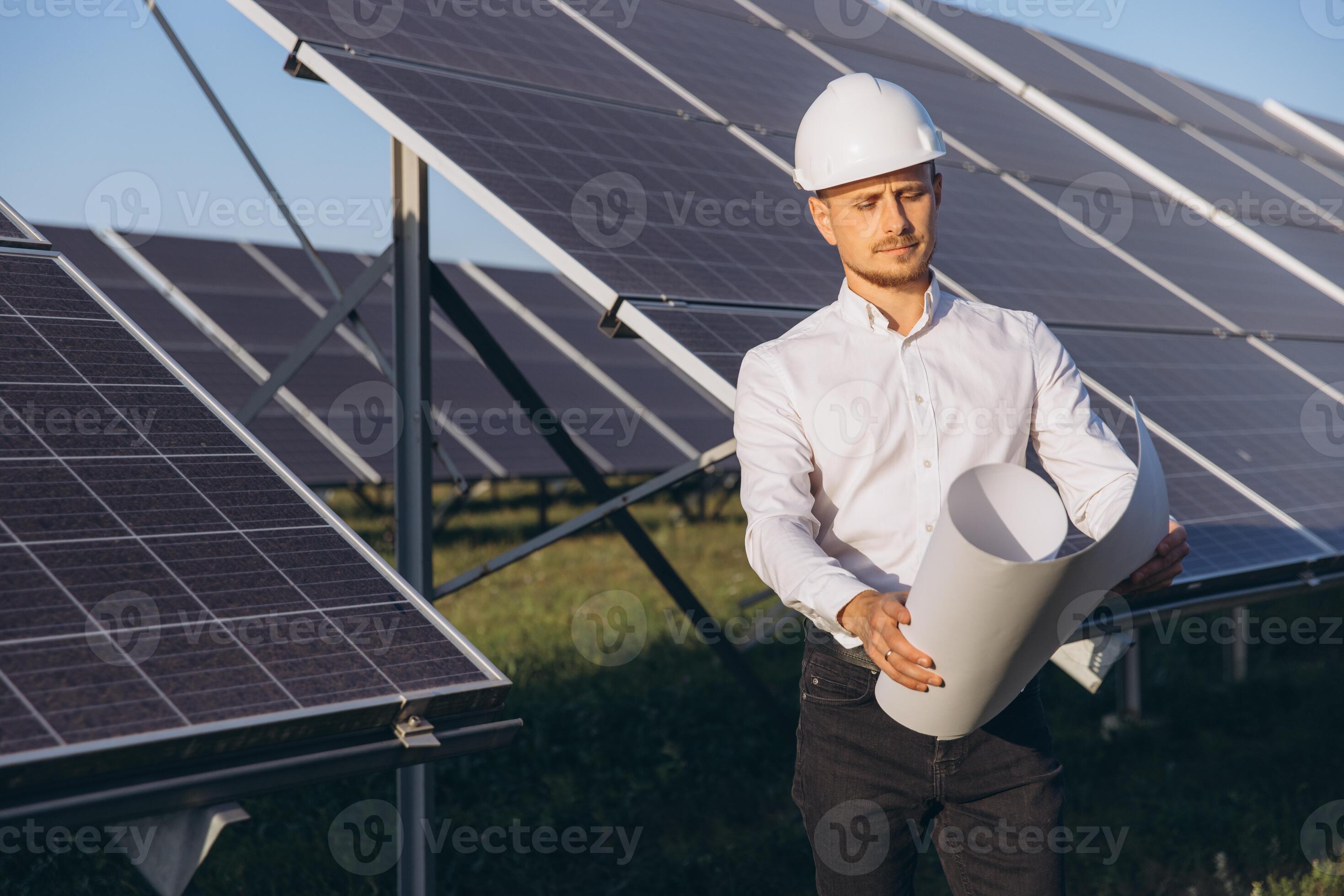 Engineers inspecting solar panels