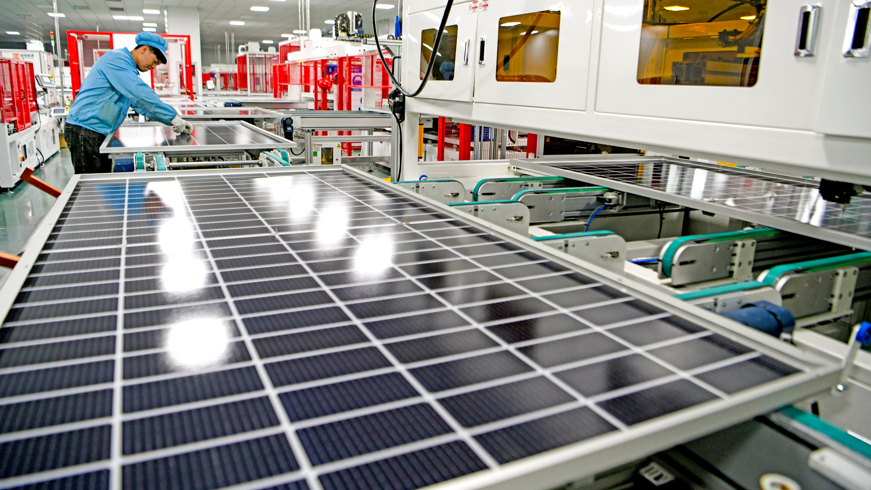 Utility-scale solar array at dusk